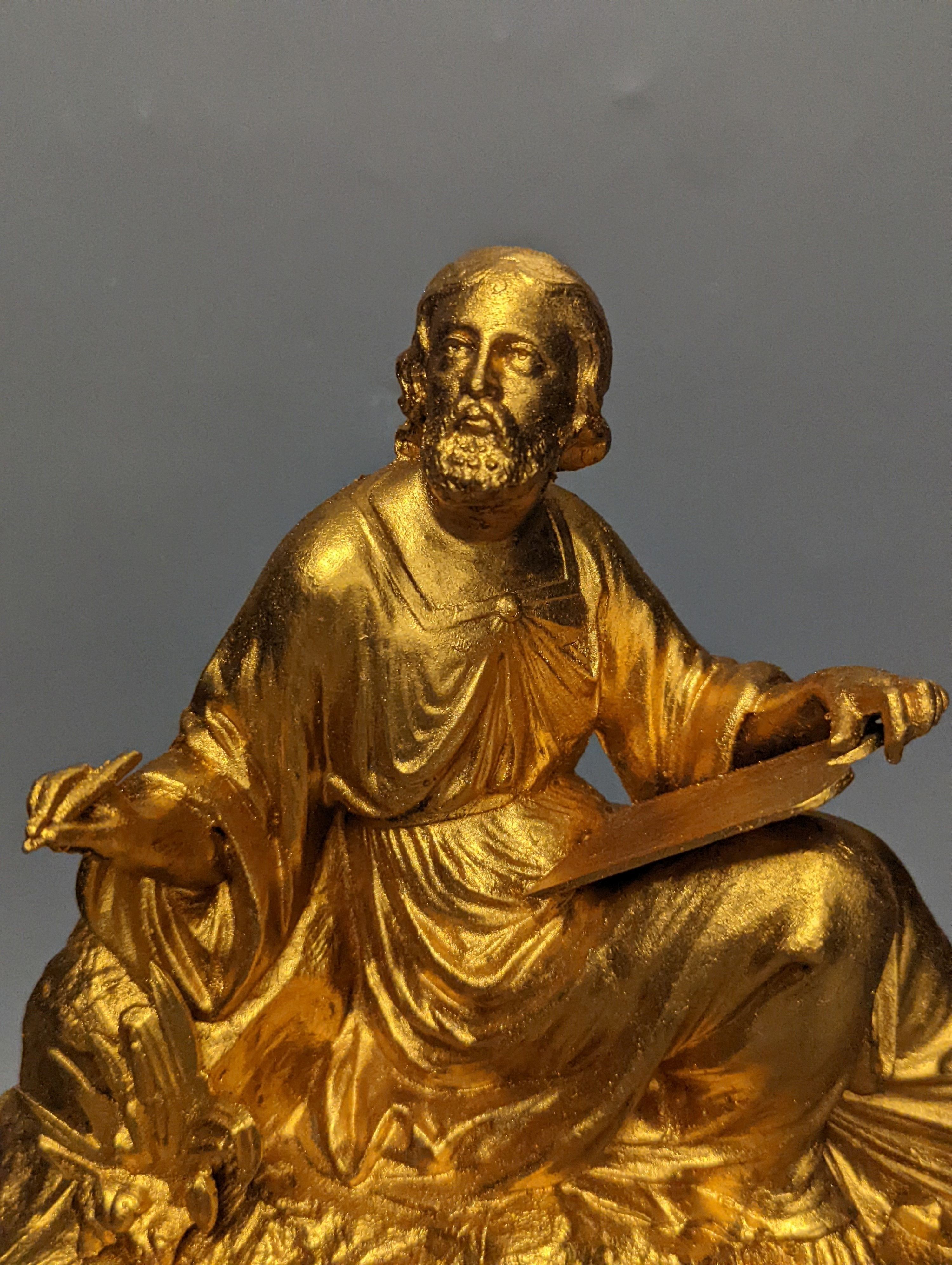 A 19th century gilt metal mantel clock case 37cm